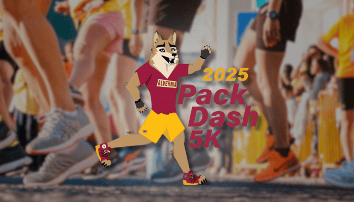 Illustration of Alvernia University’s wolf mascot running in the 2025 Pack Dash 5K with participants in the background.